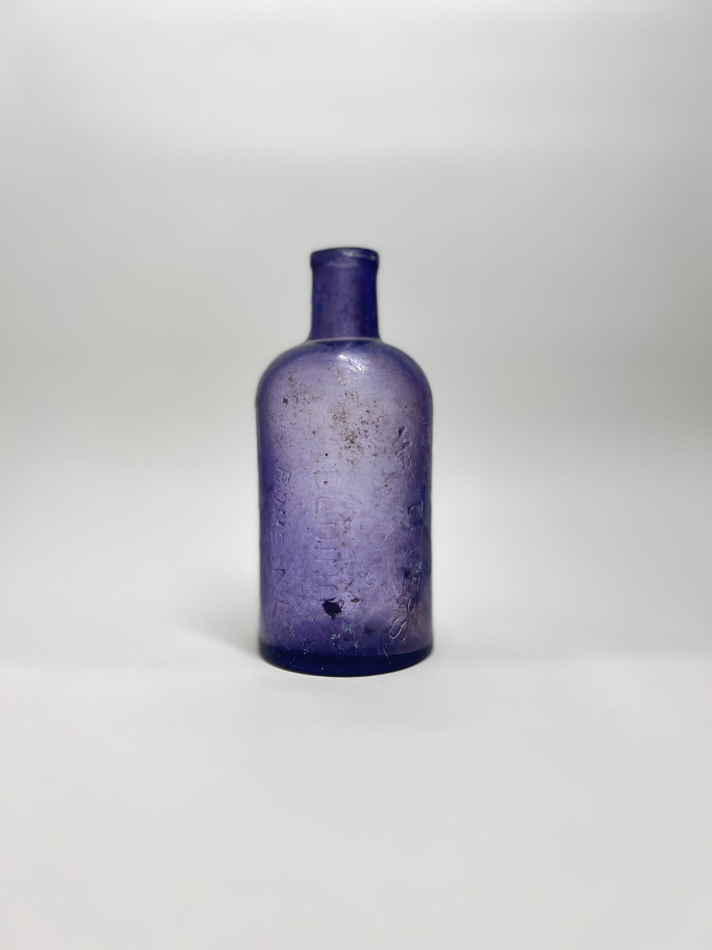 Antique Amethyst Glass Pharmacy Bottle: Blum Rome NY Embossed